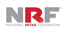 - The official logo for the National Retail Federation (NRF). The design features the acronym "NRF" in large, bold block letters. The "N" and "F" are solid grey, while the central "R" is vibrant red and stylized to resemble a retail price tag with a small white circular hole at the bottom. Below the acronym, the full name "NATIONAL RETAIL FEDERATION" is written in a smaller, grey sans-serif font. The logo includes a registration symbol and is set against a solid white background.