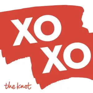 Podcast cover art for "XOXO" by The Knot. The design features a bold, red paintbrush stroke background with the letters "XO XO" written in a large, white sans-serif font across two lines. The official logo for "the knot" is written in a small, red cursive script in the bottom left corner against a white background.
